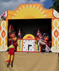 Photo of Punch and Judy on the Meadow at Emmetts Garden – National Trust